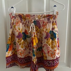 Anthro flutter smocked shorts with tassel